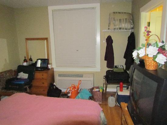 A clean, simple guest room for a longer stay