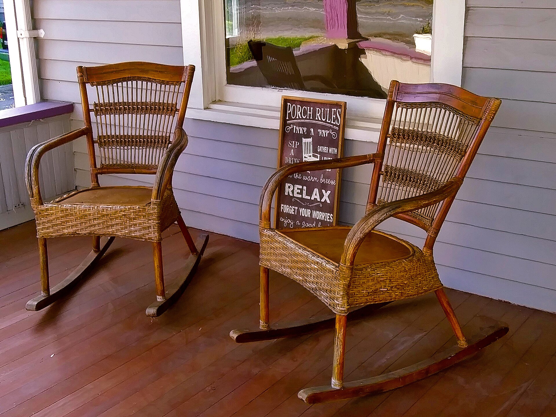 The front porch at Hotel Engelhard, lined with rocking chairs for kicking back and relaxing