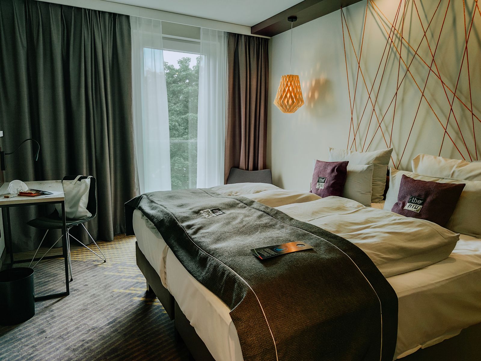 A two-bed guest room at Hotel Engelhard